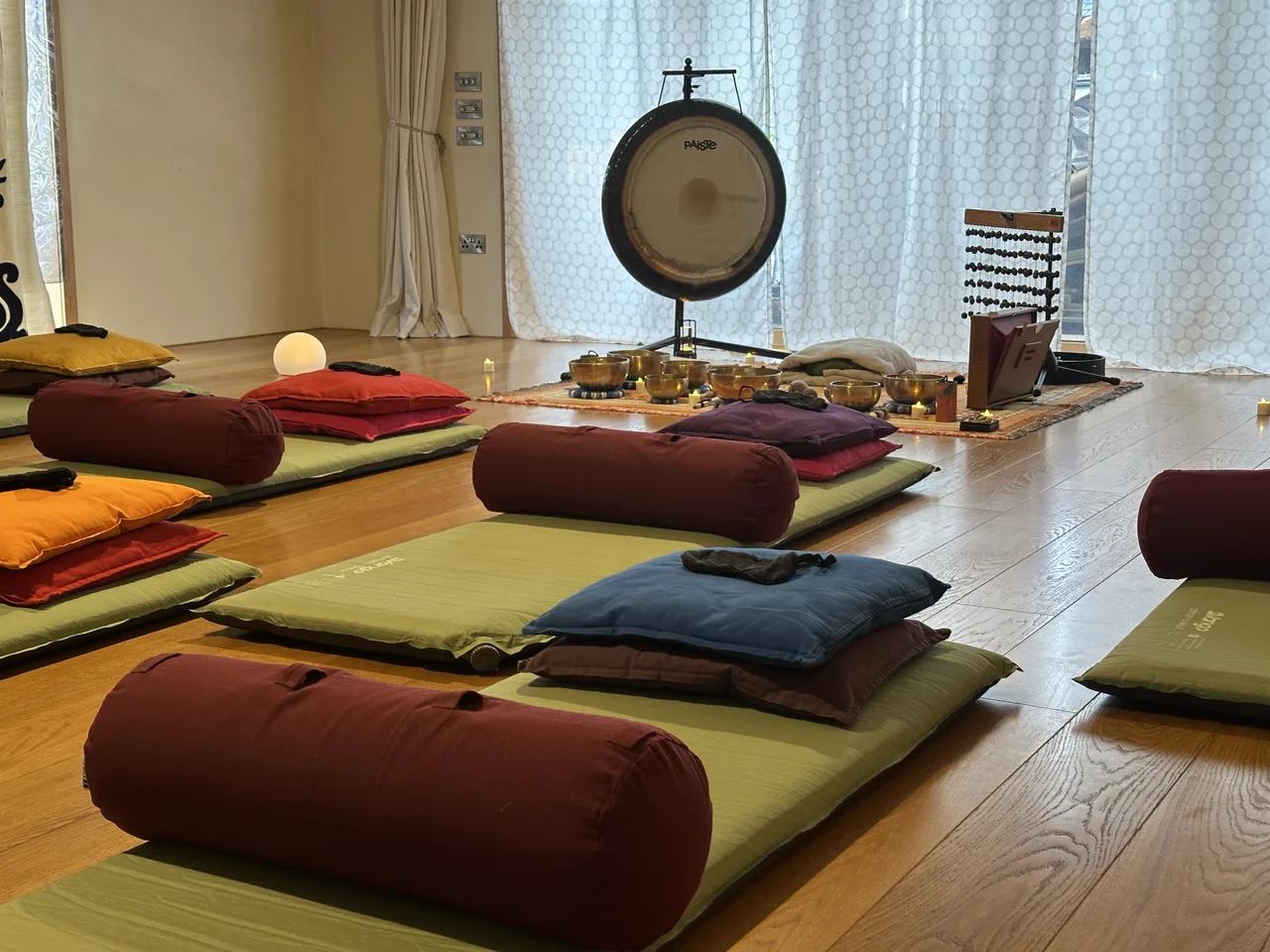 Comfortable mattresses, bolsters and blankets laid out for a Bothy Sound session