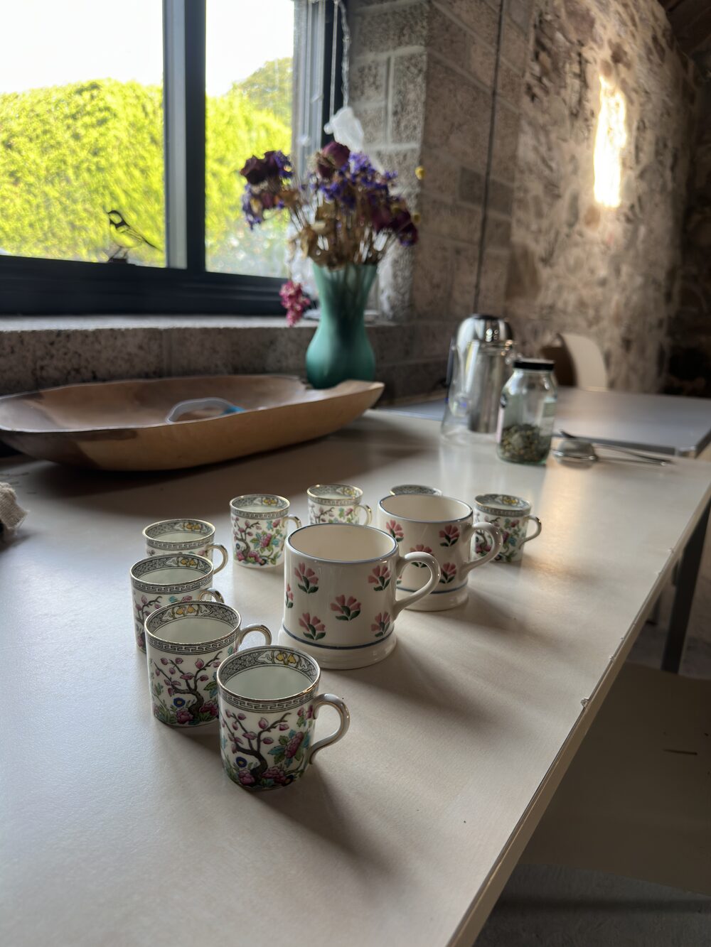 Floral cups prepared for tea after a Bothy Sound gathering
